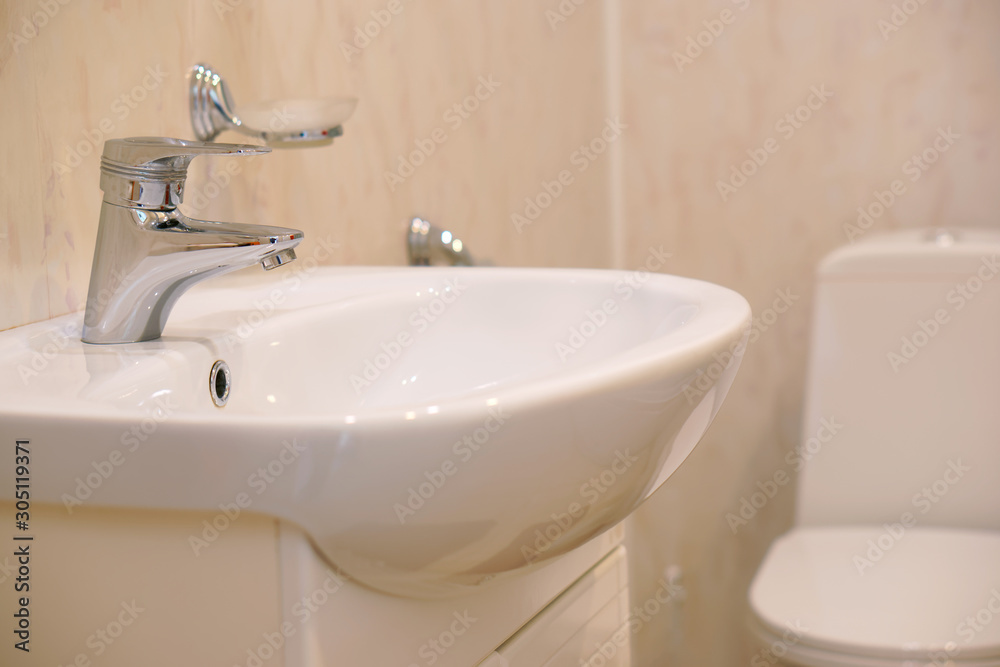 An example of installing a washbasin and toilet in one room. House, quarter, apartment or hotel An example of installing a washbasin and toilet in one room. House, quarter, apartment or hotel