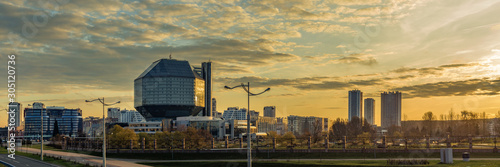 panoramic view of the modern quarter in the area of the national library in Minsk with lateral sunlight from dawn