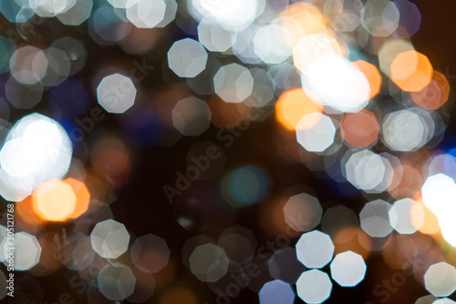 Christmas lights. Bokeh lights against a dark background.
