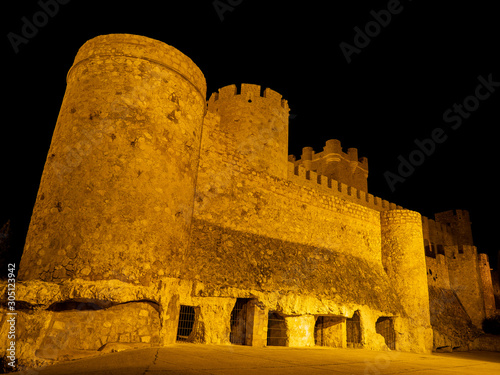 medieval castle of castalla alicante with illumination at night photo