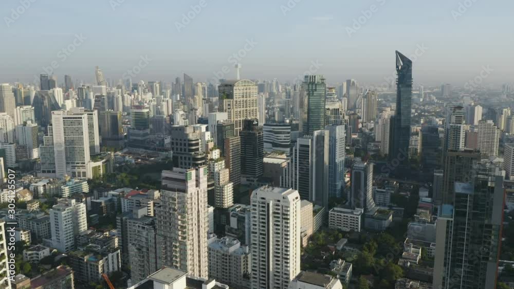 The aerial view from a drone of the center of Bangkok at Phrom Phong and Asok area with high rise buildings of offices, condominiums and modern hotels. The aerial view from a drone of the center of Bangkok at Phrom Phong and Asok area with high rise buildings of offices, condominiums and modern hotels.