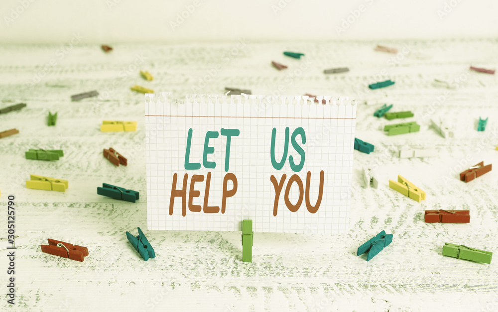 Handwriting text writing Let Us Help You. Conceptual photo Offering a service to someone to help him in his necessity Green clothespin white wood background colored paper reminder office supply
