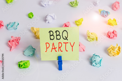 Word writing text Bbq Party. Business photo showcasing usually done outdoors by smoking meat over wood or charcoal Colored crumpled papers empty reminder white floor background clothespin