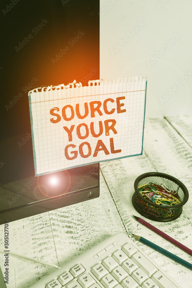 Fototapeta premium Writing note showing Source Your Goal. Business concept for work on your dreams and determine how to do that Set list Note paper taped to black computer screen near keyboard and stationary