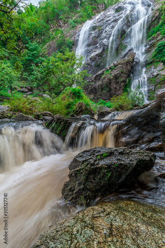 Fototapeta Naklejka Na Ścianę i Meble -  Nature Landscape View of Waterfall in Khlong Lan National Park, Kamphaeng Phet, Thailand