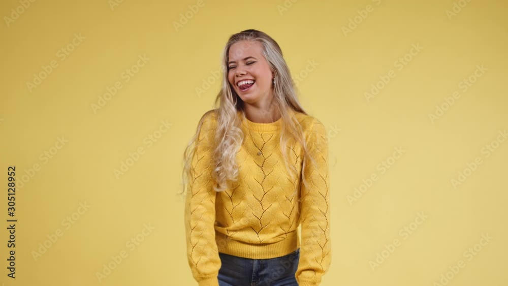 Medium Shot of a Cheerful Blonde Woman while Checking Her Teeth Medium Shot of a Cheerful Blonde Woman while Checking Her Teeth