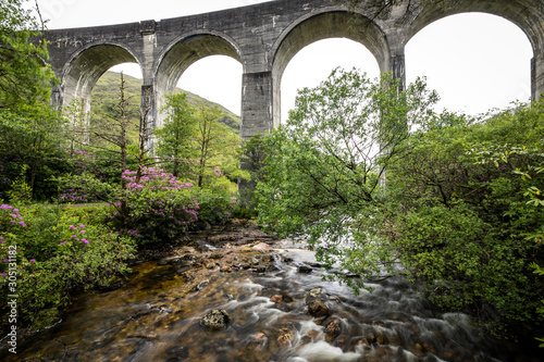 Old bridge and picturesque Scotland morning landscape.