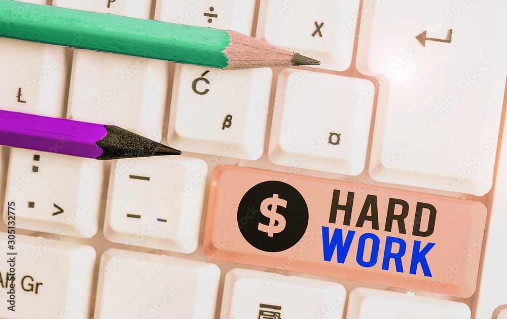 Text sign showing Hard Work. Business photo text always putting a lot of effort and care into work or endurance Text sign showing Hard Work. Business photo text always putting a lot of effort and care into work or endurance