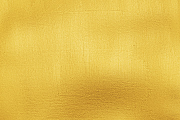 Gold background. Golden paint texture shiny wall suface