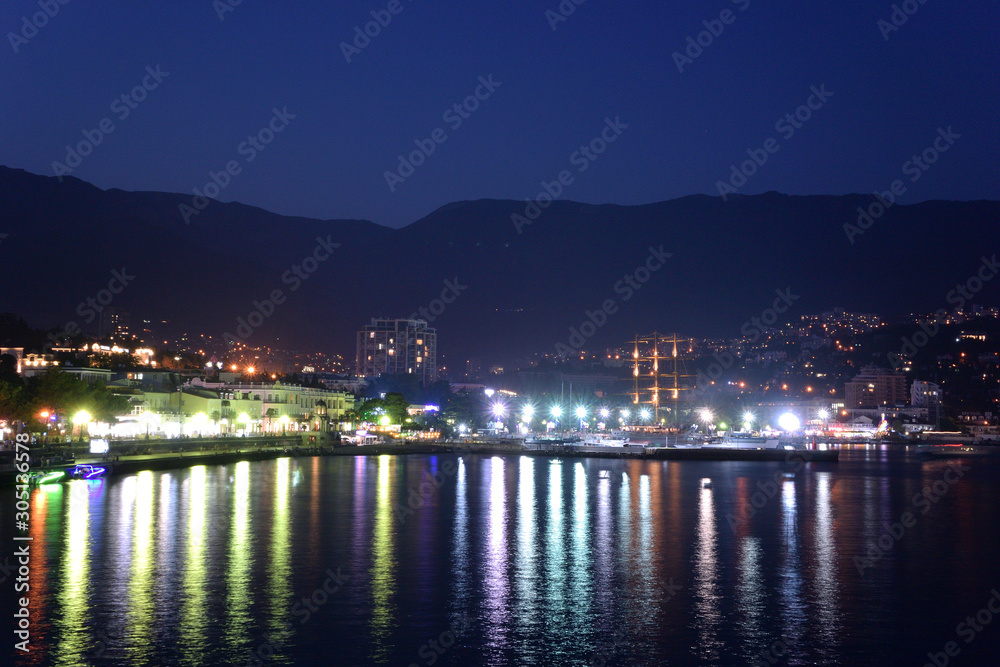View of the evening embankment of the city of Yalta