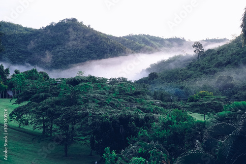 Clouds covering beautiful valleys Suan Phueng mountain in rainy season, Ratchaburi  Province,Thailand photo