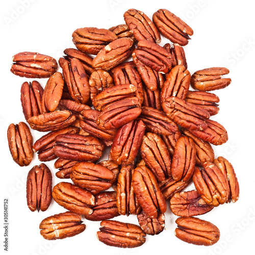 Peeled pecan nuts isolated on a white background. Top view.