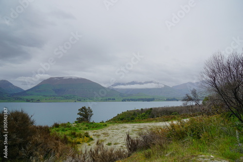 Fototapeta Naklejka Na Ścianę i Meble -  A foggy day in a spring time in the country side of Glenorchy, New Zealand