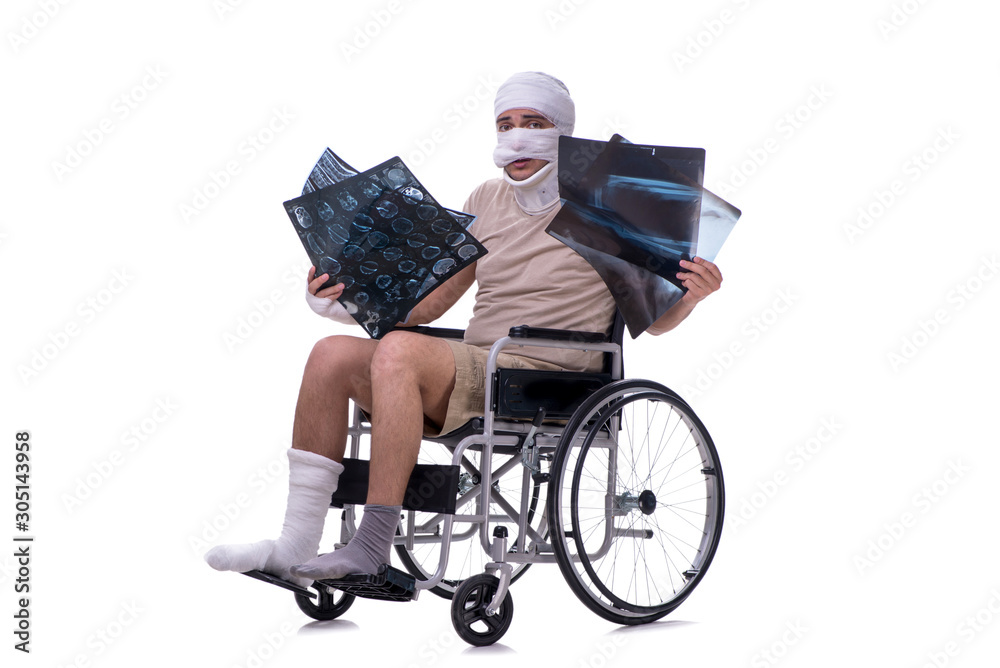 Injured man in wheel-chair isolated on white Injured man in wheel-chair isolated on white