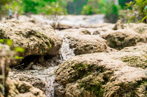 Water flowing through the rocks at Waterfall, Luang Prabang, Laos