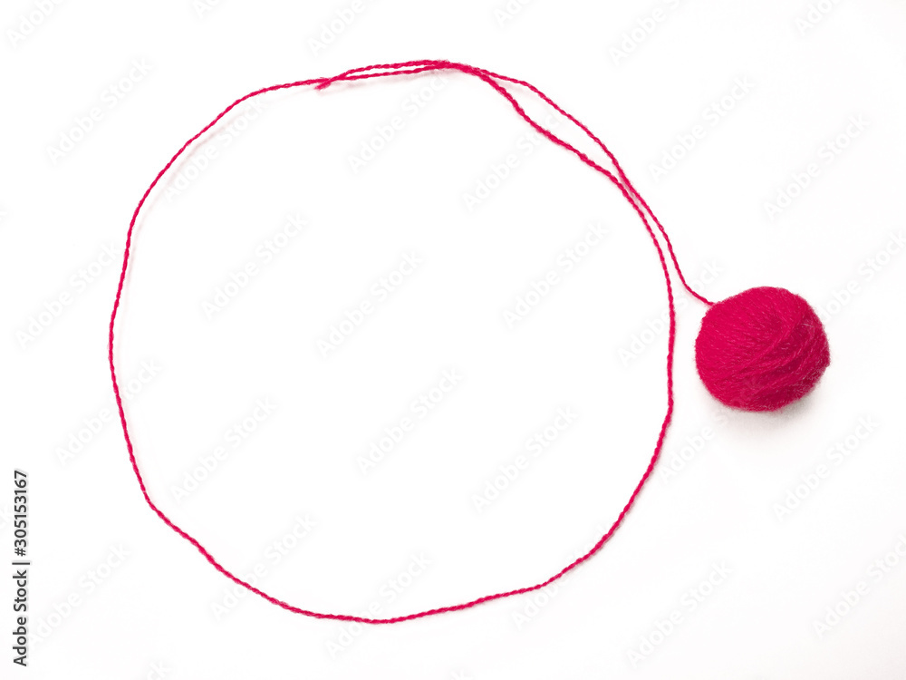 Red knitting yarn for handicrafts isolated on white background. Background of wool yarn, knitted yarn, can also be used as a yarn frame. Red knitting yarn for handicrafts isolated on white background. Background of wool yarn, knitted yarn, can also be used as a yarn frame.