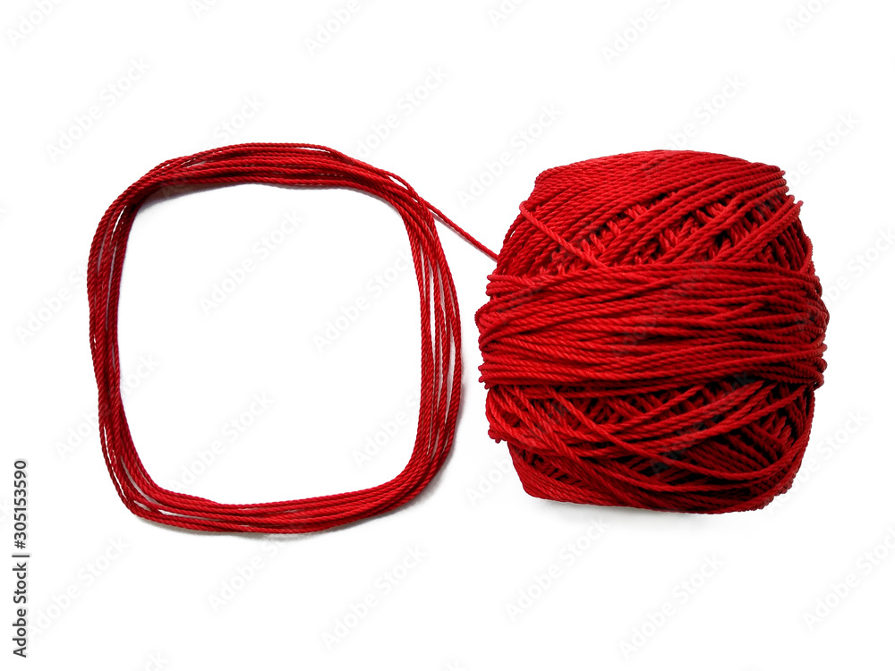 Red knitting yarn for handicrafts isolated on white background. Background of wool yarn, knitted yarn, can also be used as a yarn frame. Red knitting yarn for handicrafts isolated on white background. Background of wool yarn, knitted yarn, can also be used as a yarn frame.