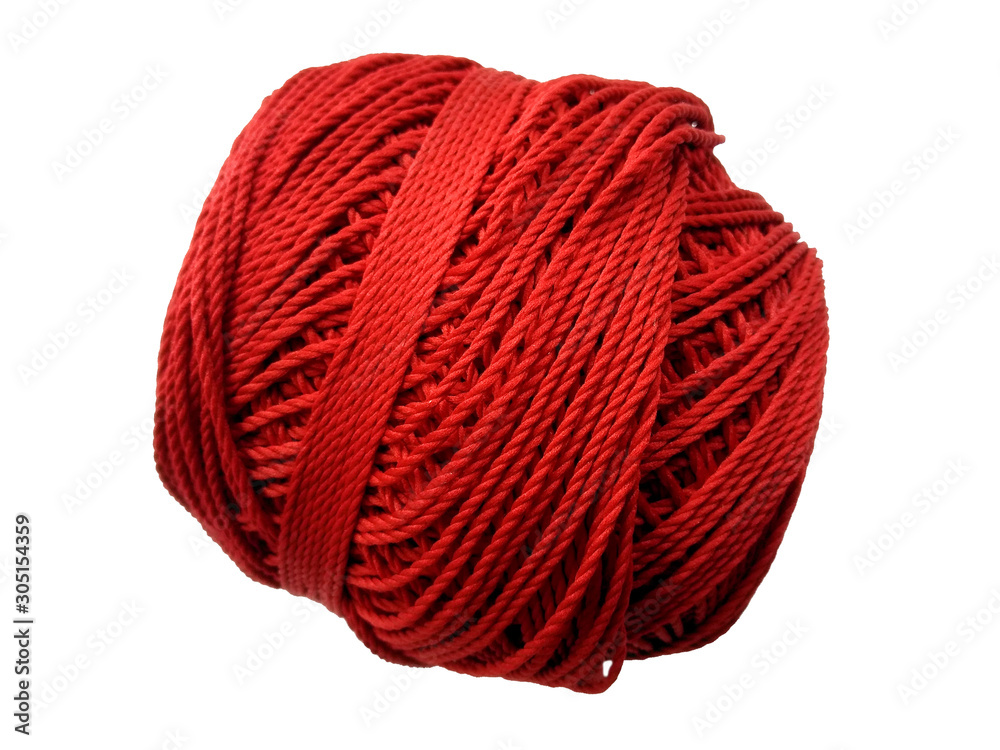 Fototapeta premium Red knitting yarn for handicrafts isolated on white background. Background of wool yarn, knitted yarn, can also be used as a yarn frame.