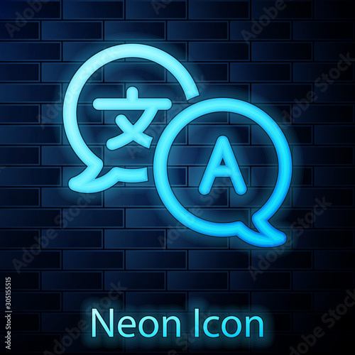 Glowing neon Translator icon isolated on brick wall background. Foreign language conversation icons in chat speech bubble. Translating concept.  Vector Illustration