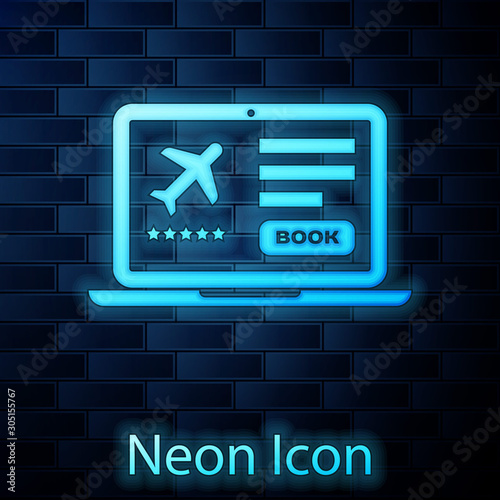 Glowing neon Laptop with electronic boarding pass airline ticket icon isolated on brick wall background. Passenger plane mobile ticket for web and app.  Vector Illustration