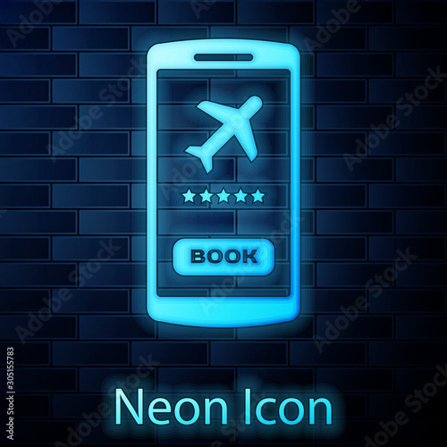 Glowing neon Smartphone with electronic boarding pass airline ticket icon isolated on brick wall background. Passenger plane mobile ticket for web and app.  Vector Illustration