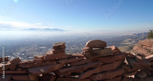 View over a small wall made out of local rocks on top of hill