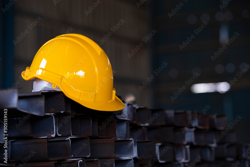 Yellow Color Safety Helmet On Steel Bars In Construction Site, Safety