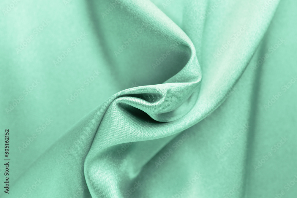 Fototapeta premium Texture of turquoise fabric, closeup