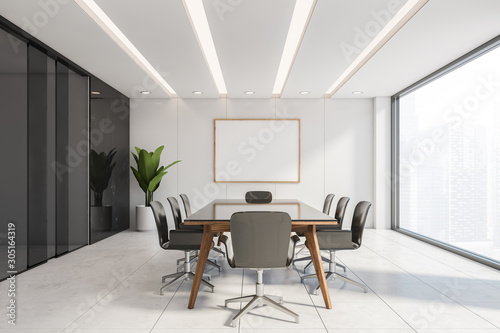 Black marble conference room with poster