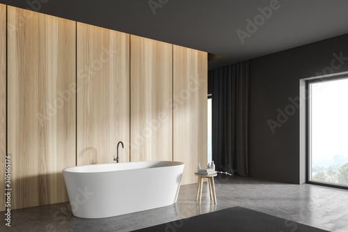 Wooden and gray bathroom corner with tub