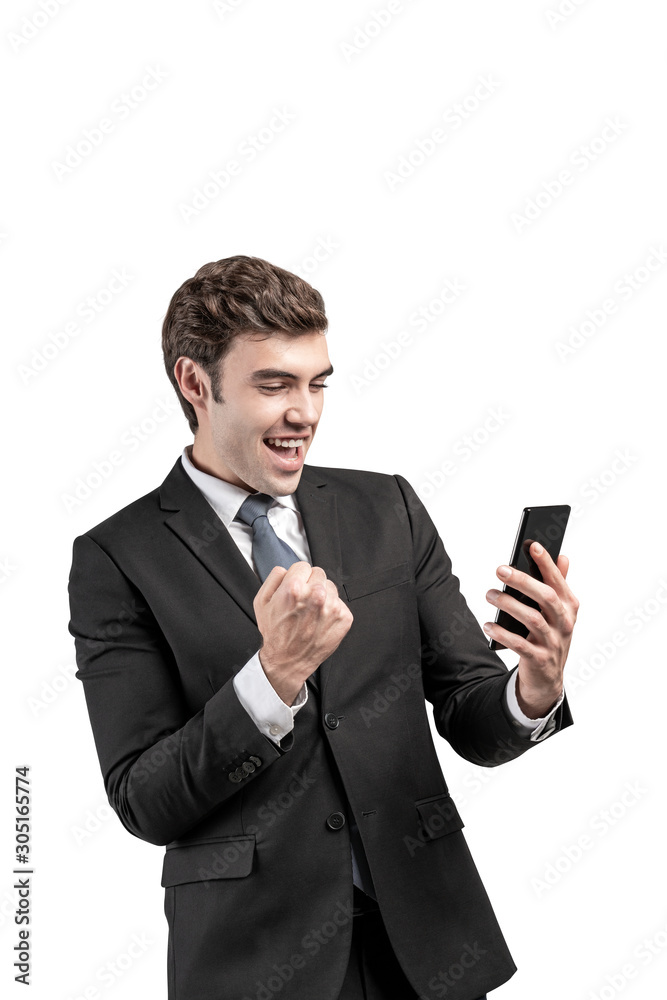 Happy businessman with phone celebrating, isolated Happy businessman with phone celebrating, isolated