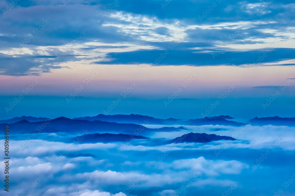 Sky over the foggy hills in National Park Kiew Mae Pan, Doi Inthanon ,Chiang Mai Thailand