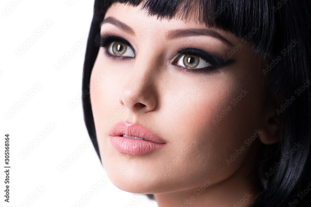 Fototapeta premium Beautiful brunette woman with fashion makeup.