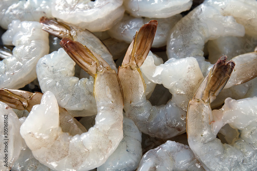 Фотография large raw peeled shrimps, macro