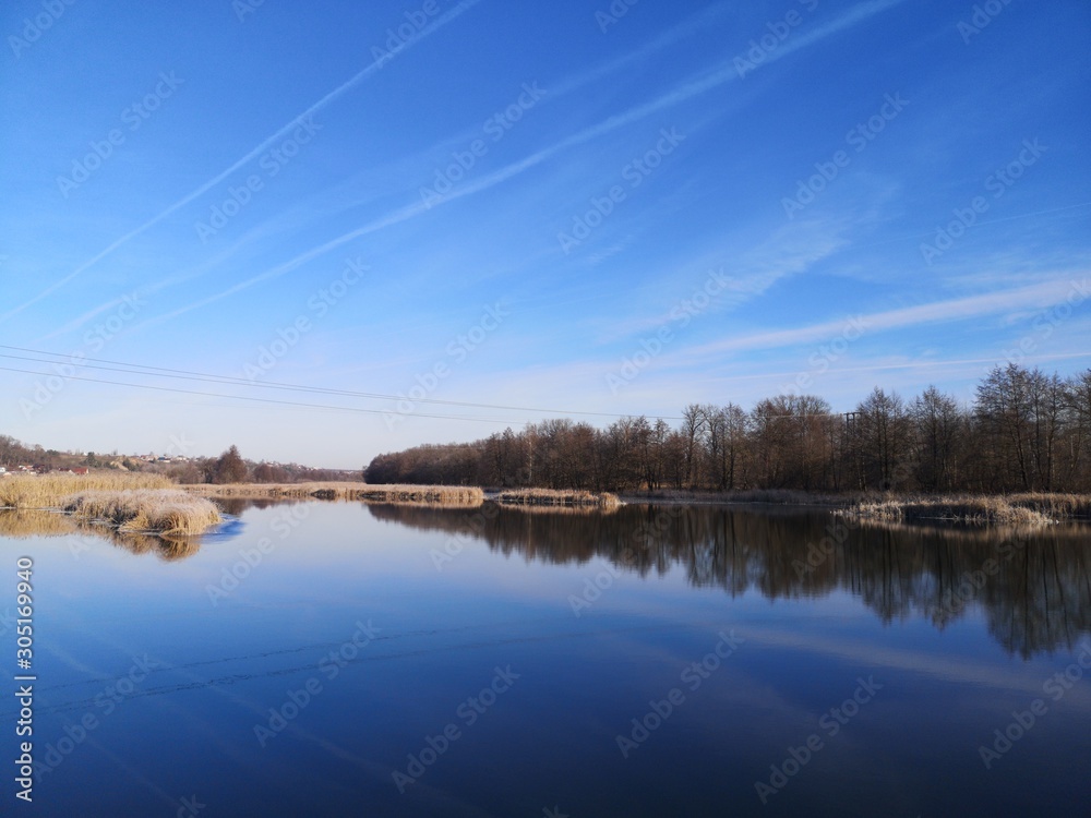  mirror surface of the water and perfect sky