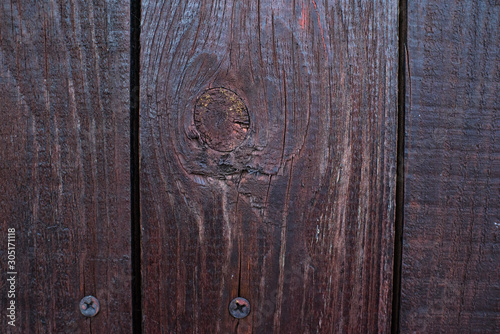 Painted wood brown background. Texture.