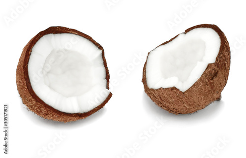 broken coconut with white filling inside on a white background