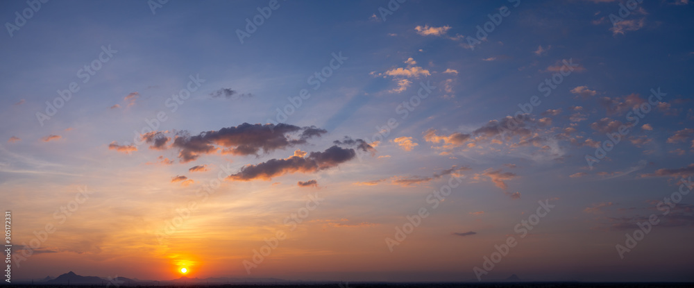 Beautiful sunstset sky over the mountain with copyspace,panorama.