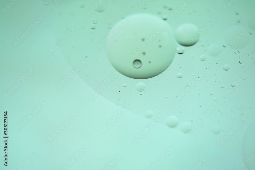 Oil drops in water. Defocused abstract psychedelic pattern image light blue colored. DOF. Oil drops in water. Defocused abstract psychedelic pattern image light blue colored. DOF.