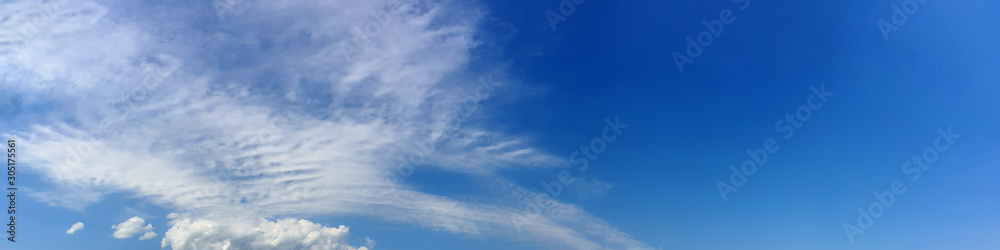 Fototapeta premium Panorama sky with cloud on a sunny day. Beautiful cirrus cloud. Panoramic image.