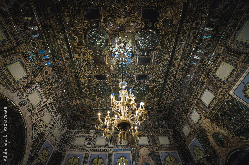 Tehran, Iran October 15, 2016 Decorated ceiling with large chandelier in one of the buildings