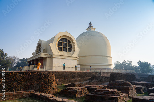 View of  Parinirvana Stupa and temple place for Buddhist pilgrimage site and this place of Buddha attained Parinirvana after his death photo