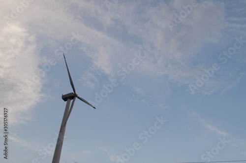 Wind turbines anWind turbines and blue skiesd blue skies