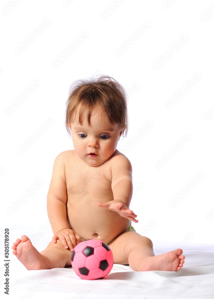 Little baby plays with small football ball Little baby plays with small football ball