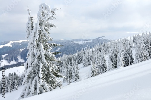 Beautiful picturesque winter slope with funiculars