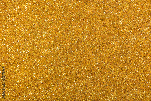 Contrast yellow glitter background for your holiday new desktop. High quality texture.