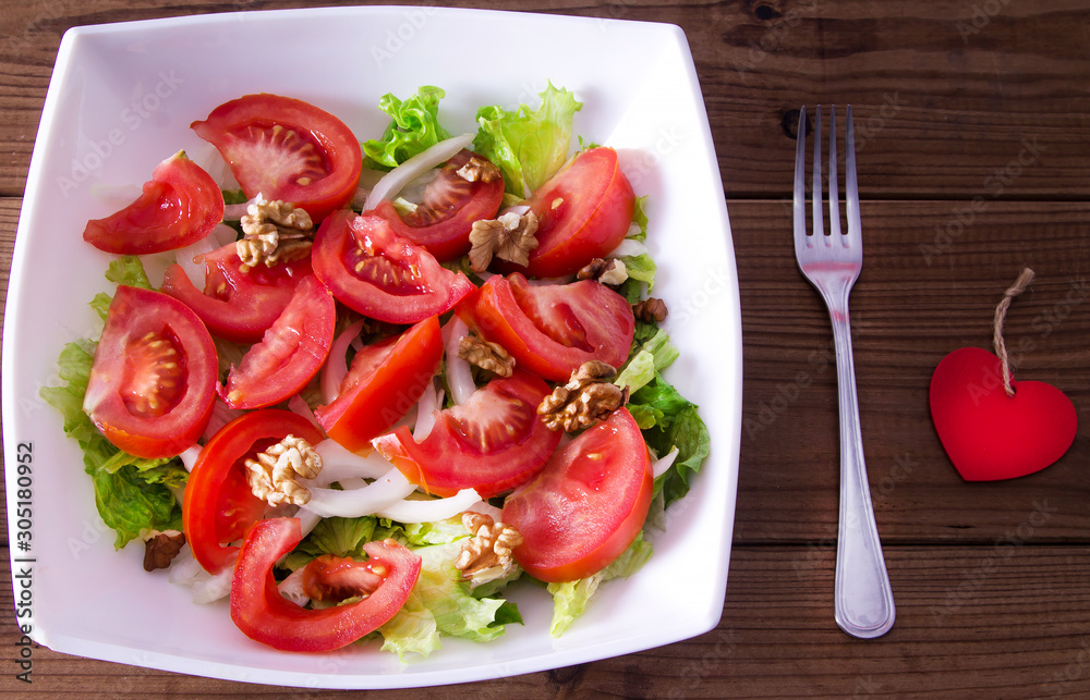 lettuce and tomato salad, diet and food concept lettuce and tomato salad, diet and food concept