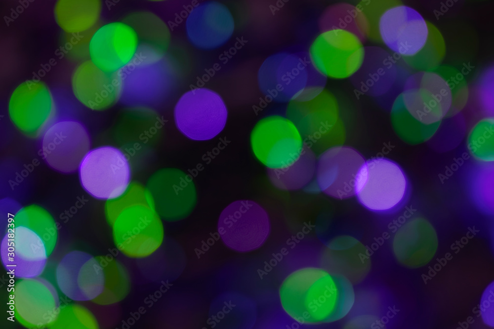 green and purple bright blurry festive bokeh background