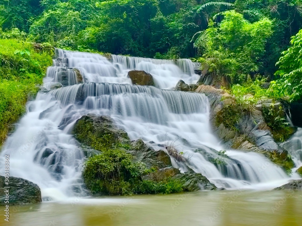 Beautiful rain forest waterfall in Uttaradit, Thailand Beautiful rain forest waterfall in Uttaradit, Thailand