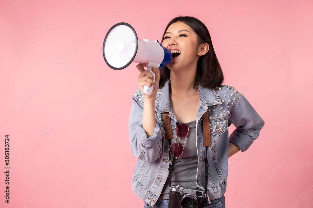 Fototapeta premium Tourist woman in summer casual clothes.Asian Smiling woman .Passenger traveling abroad to travel on pink background.She going to summer vacation.Travel trip funny Credit card on holiday.